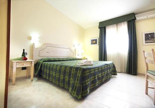 Hotel Pausania Inn, kamer