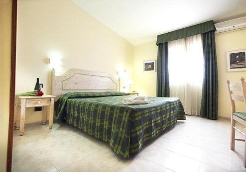 Hotel Pausania Inn, kamer