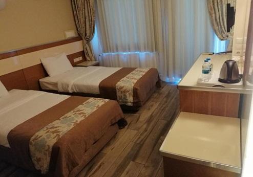 Iris Hotel, kamer