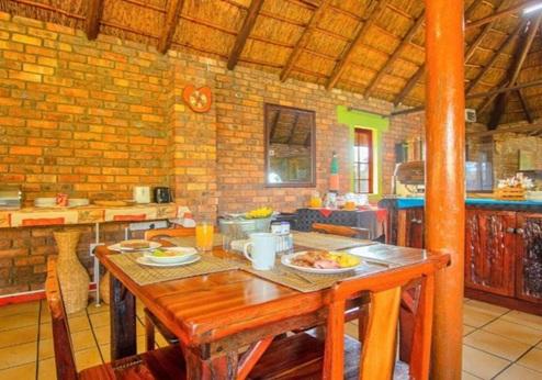 Airport Game Lodge, ontbijtruimte